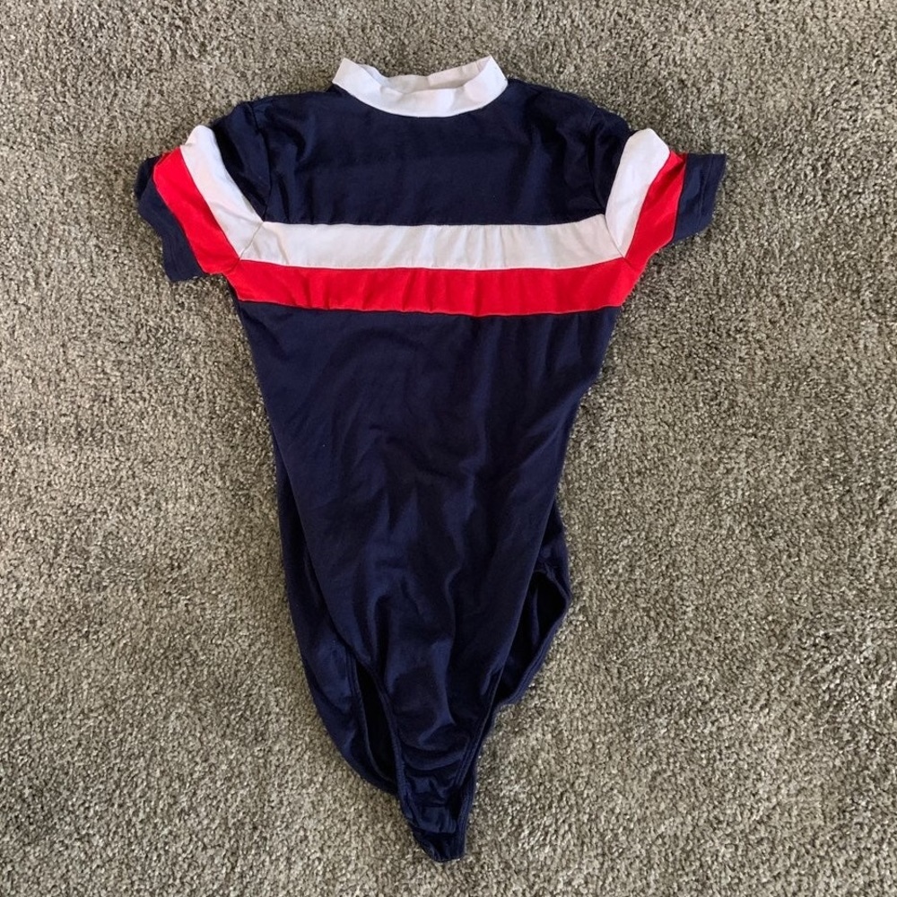 Rue21, large, 92% polyester and 8% spandex.